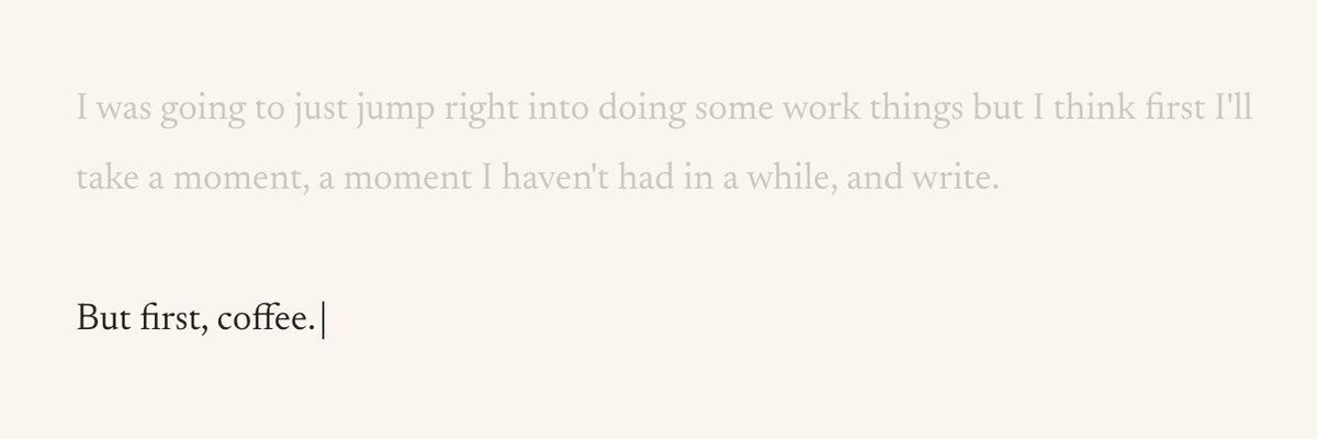 Text on a beige background reading "But first, coffee." with a longer paragraph above it in lighter gray text.